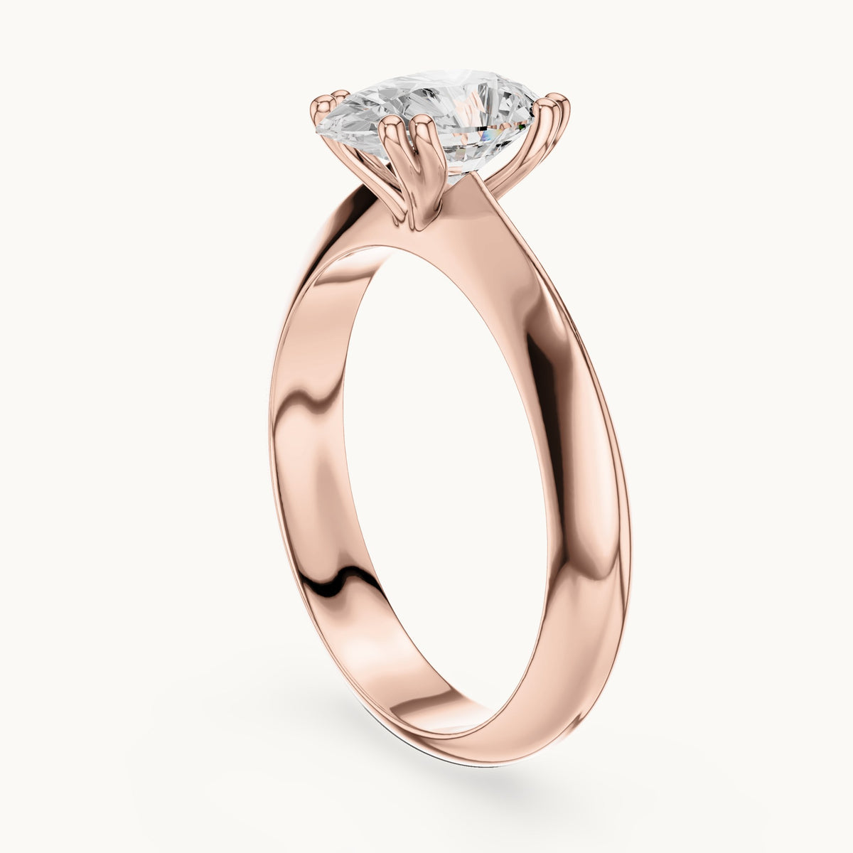 Pear lab-grown diamond double-prong knife-edge solitaire engagement ring in rose gold, 1.50 CT TW, view 1
