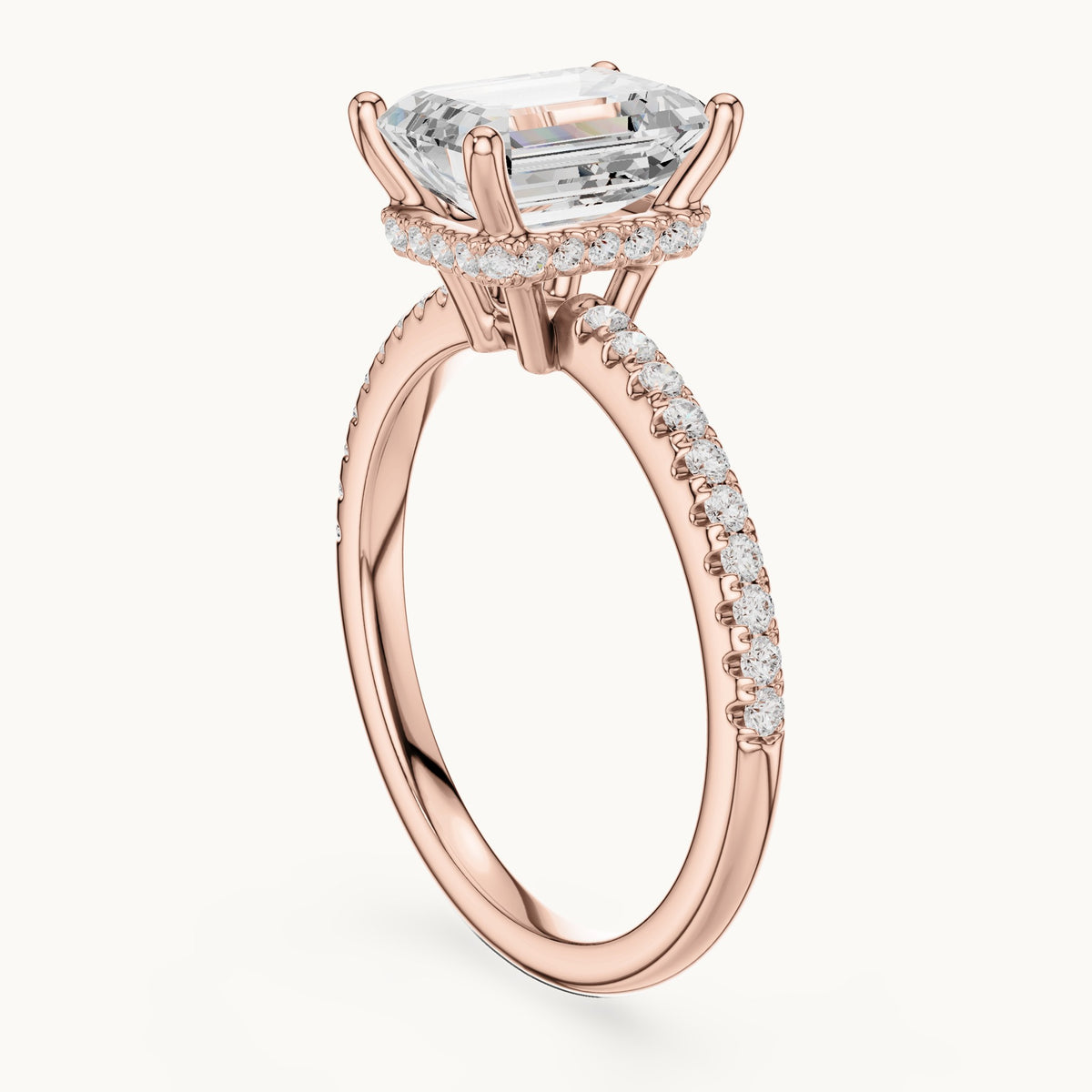 Emerald-cut lab-grown diamond petite pavé hidden halo engagement ring in rose gold, 2.31 CT TW, view 1