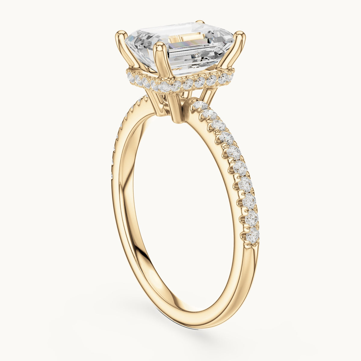 Emerald-cut lab-grown diamond petite pavé hidden halo engagement ring in yellow gold, 2.31 CT TW, view 1