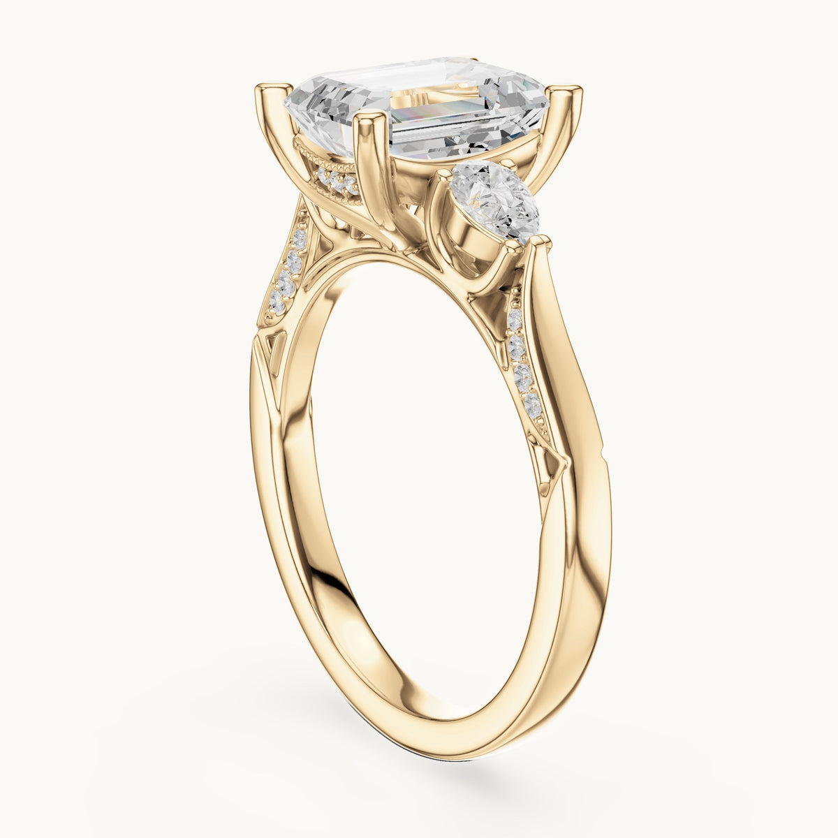 Emerald-cut lab-grown diamond three-stone engagement ring with side diamonds in yellow gold, 2.54 CT TW, view 1
