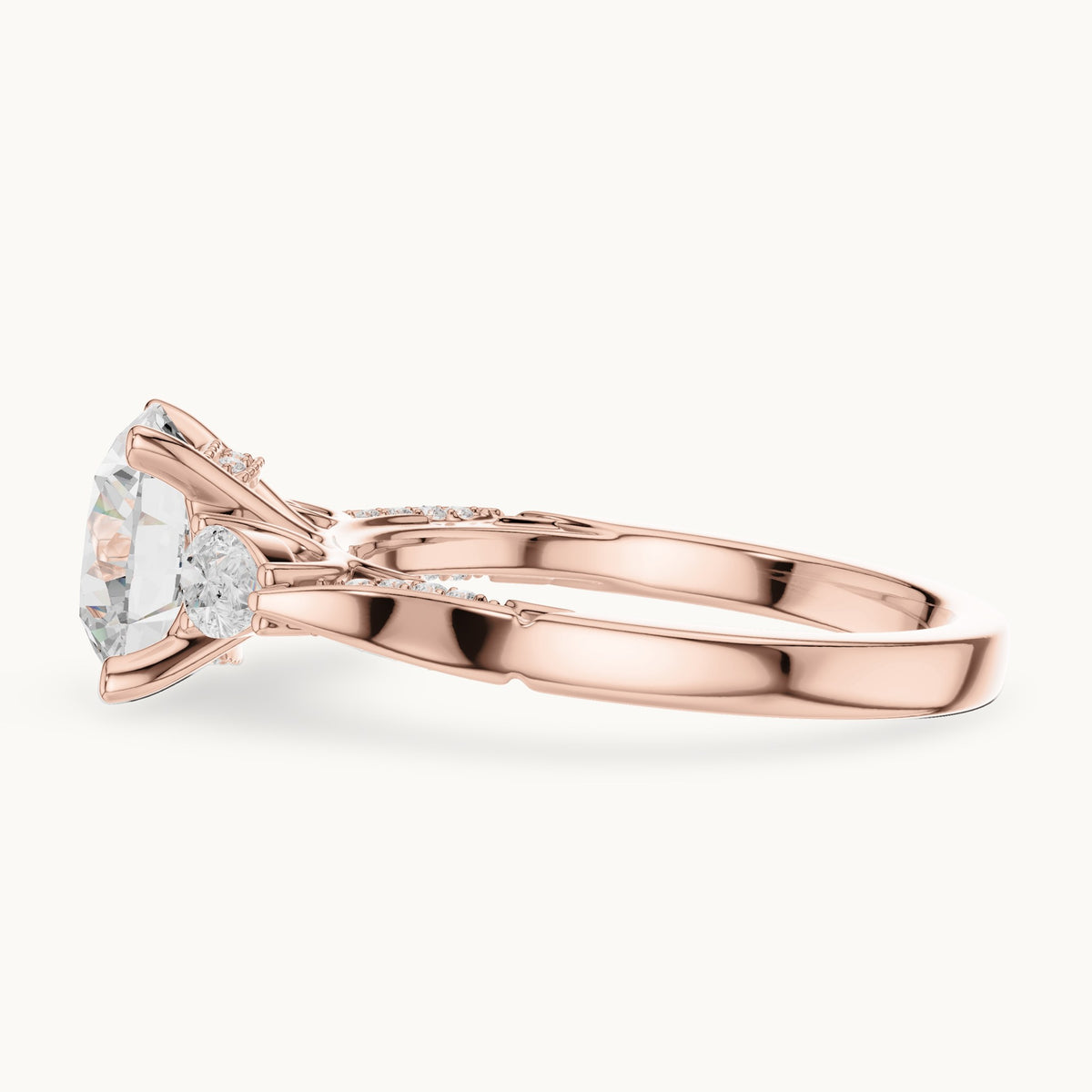 Round lab-grown diamond three-stone engagement ring with side diamonds in rose gold, 2.54 CT TW, view 3