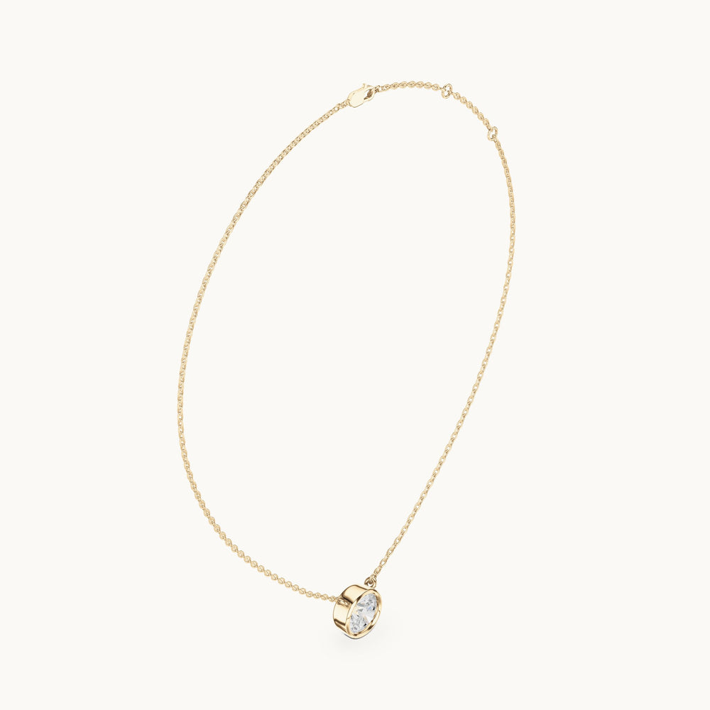 Round lab-grown diamond bezel-set solitaire pendant with chain in yellow gold, 2.50 CT TW, view 1