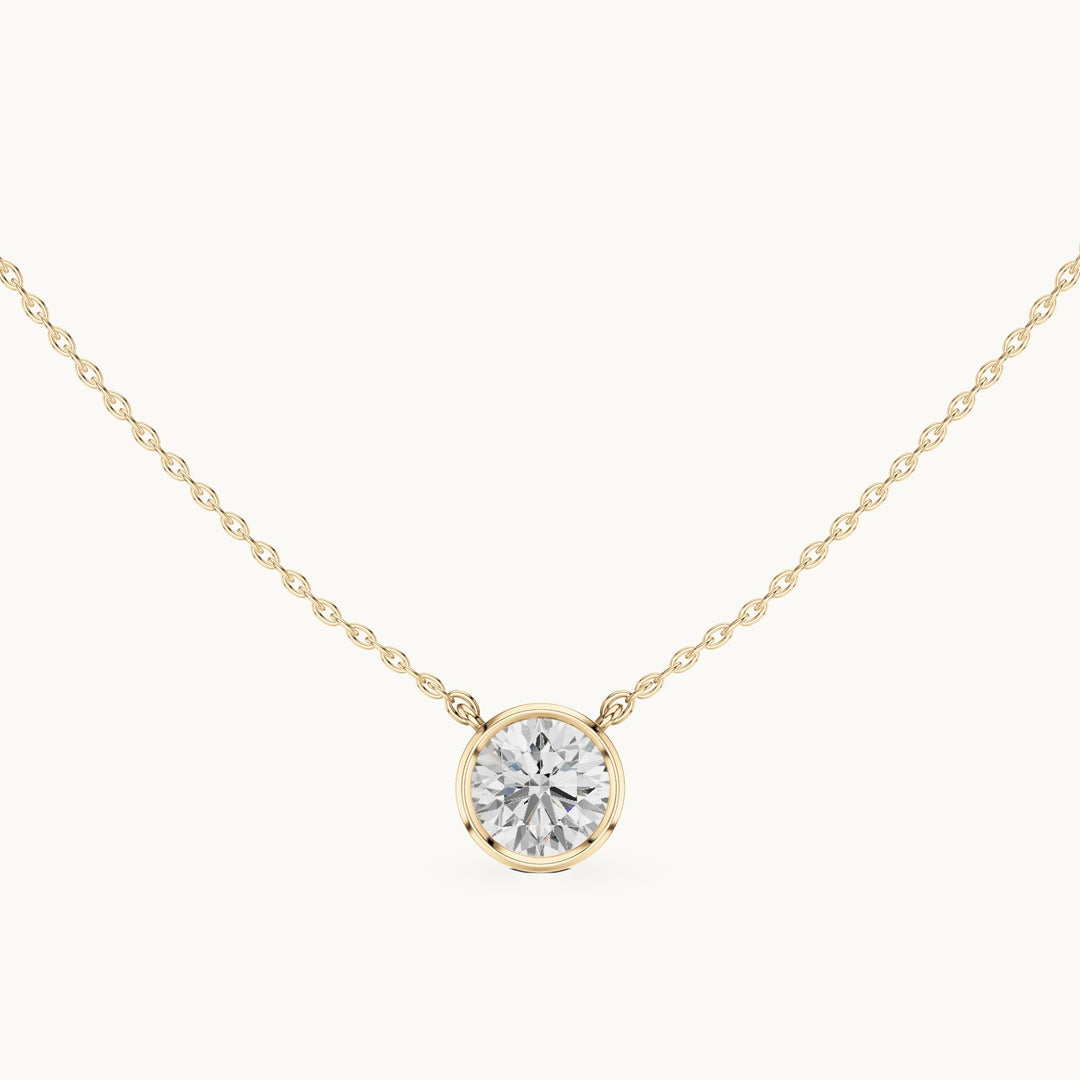 Round lab-grown diamond bezel-set solitaire pendant with chain in yellow gold, 2.50 CT TW, view 4