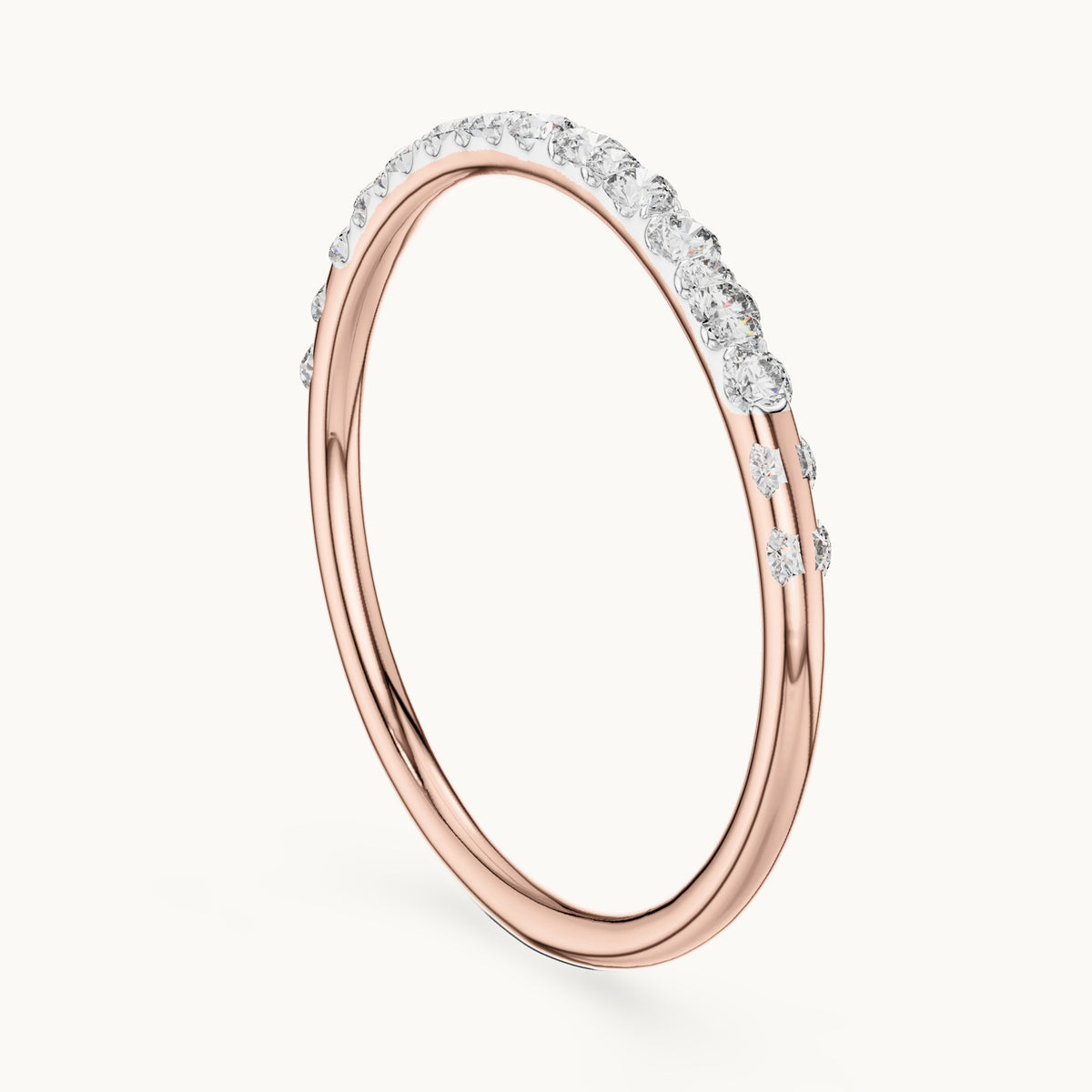 Round cut lab-grown diamond half eternity band in 14K rose gold, 0.12 CT TW, view 1
