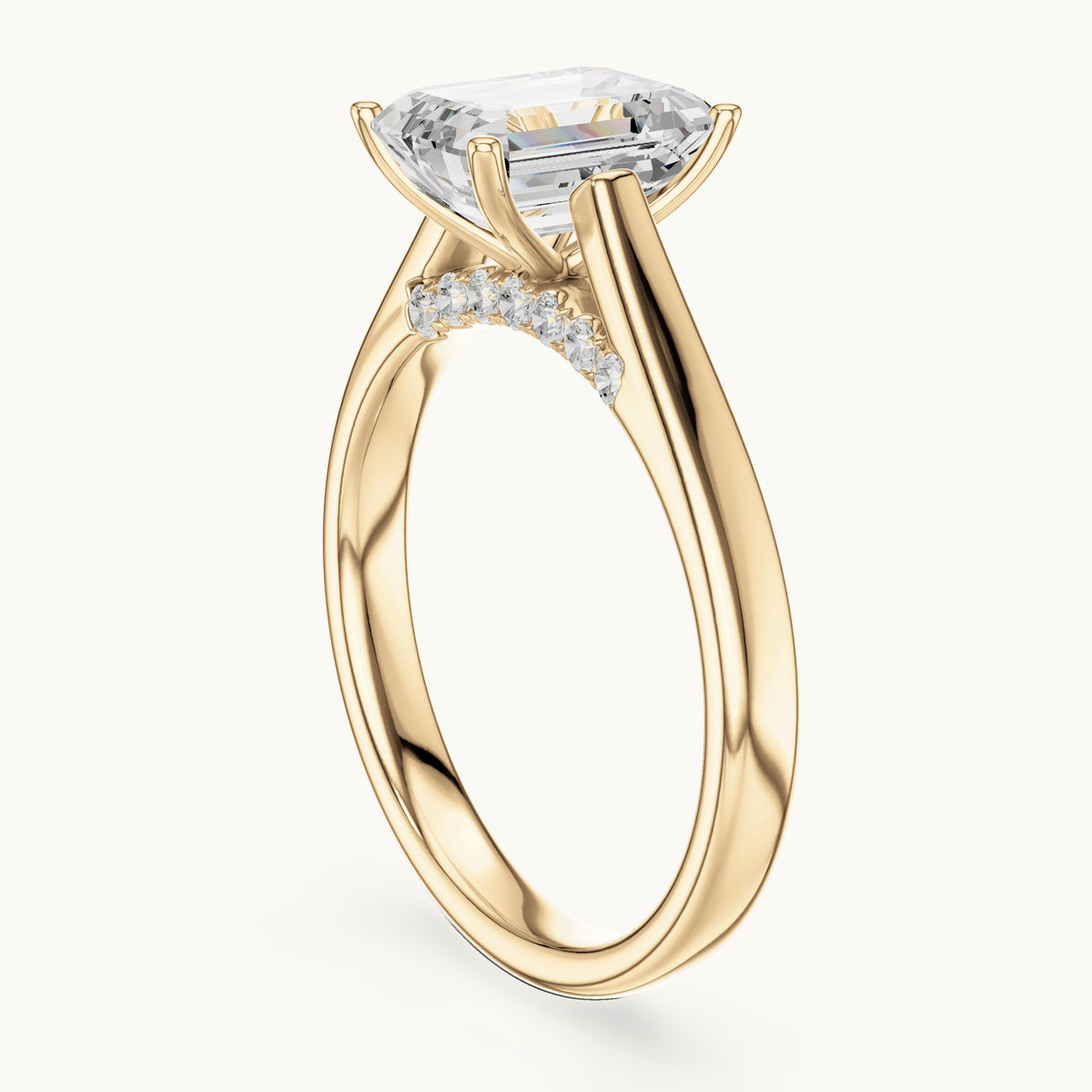 Emerald-cut lab-grown diamond cathedral solitaire engagement ring with hidden diamond accents in yellow gold, 2.168 CT TW, view 1