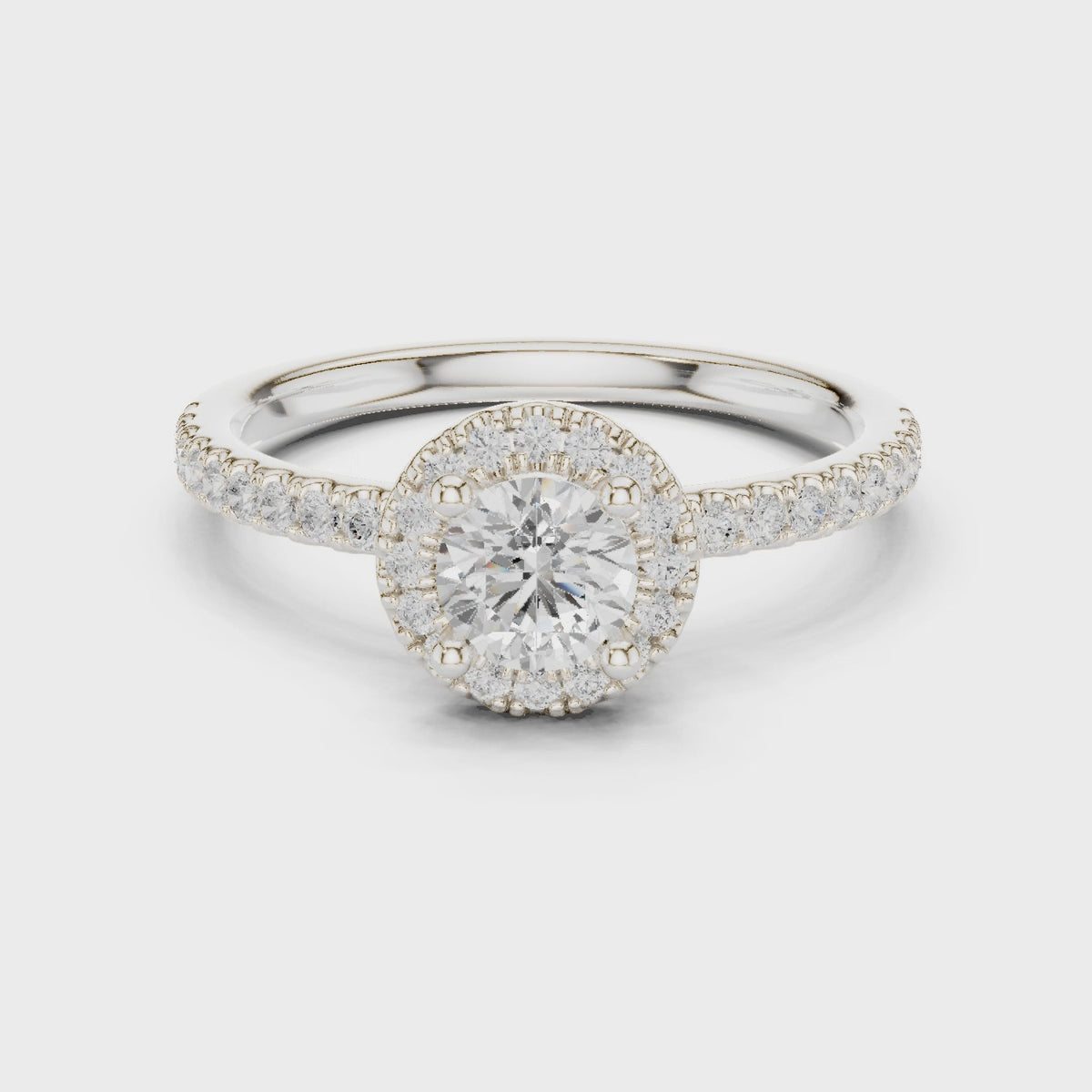 Round lab-grown diamond halo engagement ring in white gold, 360 degree video