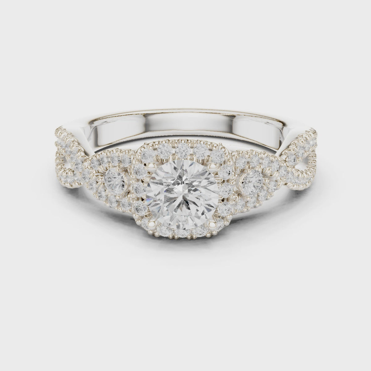 Round lab-grown diamond twisted halo engagement ring in white gold, 360 degree video
