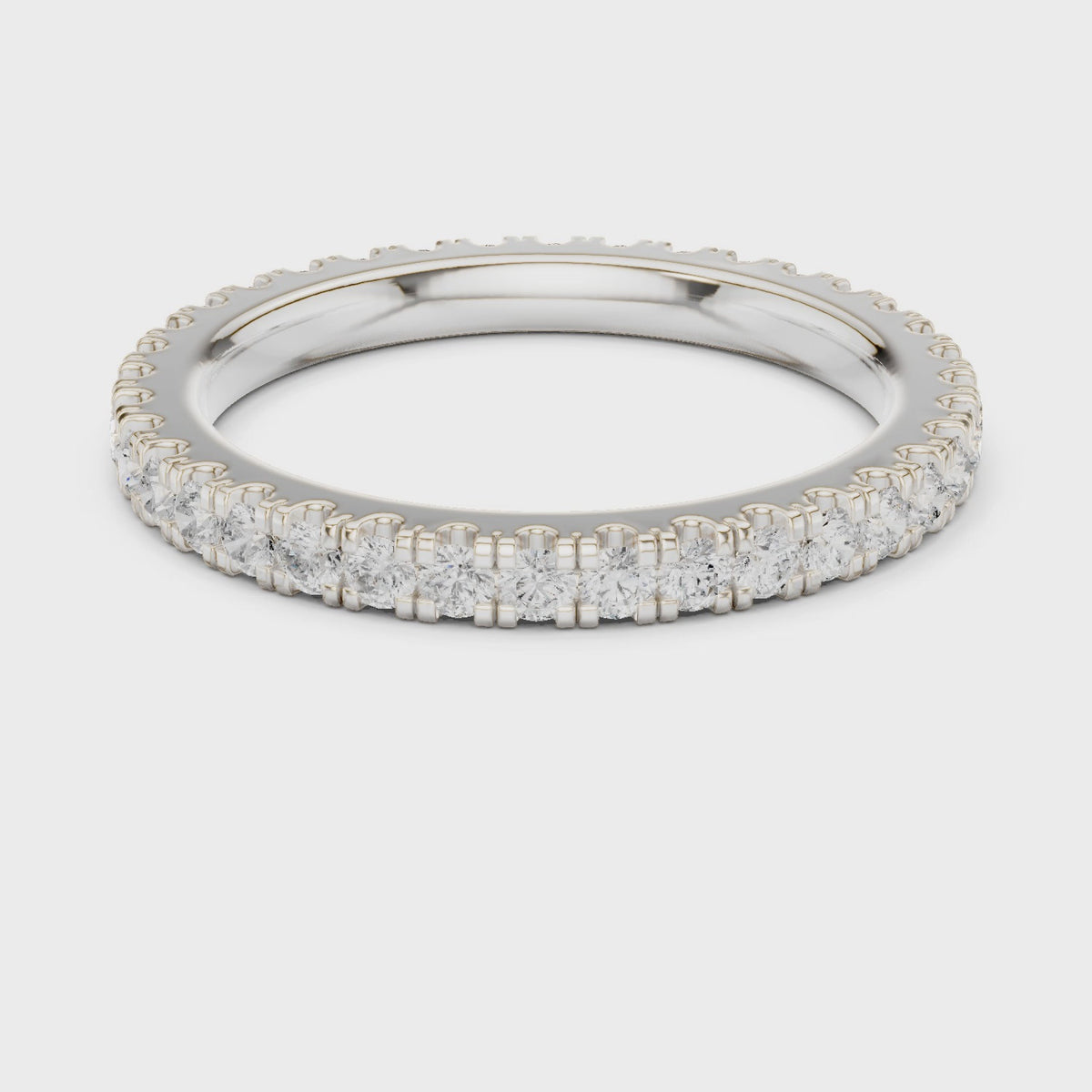 Round lab-grown diamond full eternity band in white gold, 360 degree video