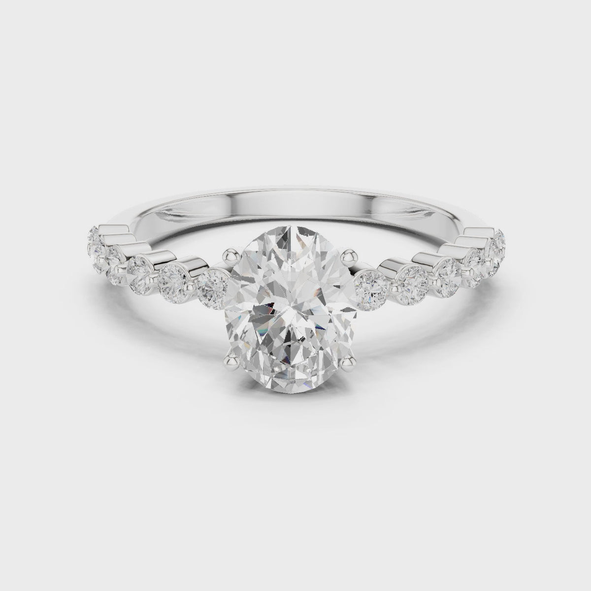 Oval lab-grown diamond ring with side stones in white gold, 360 degree video