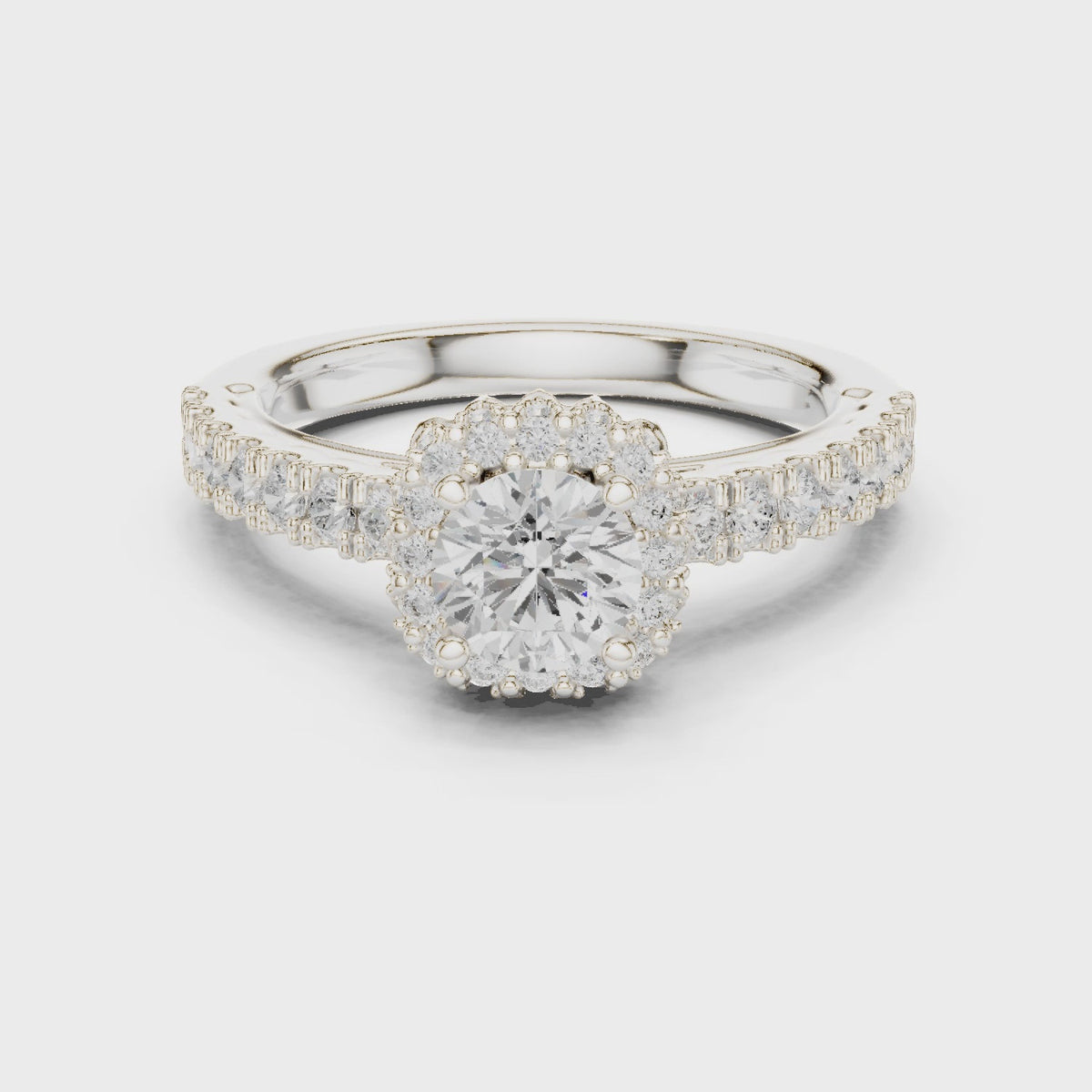 Round lab-grown diamond halo engagement ring with side stones in white gold, 360 degree video