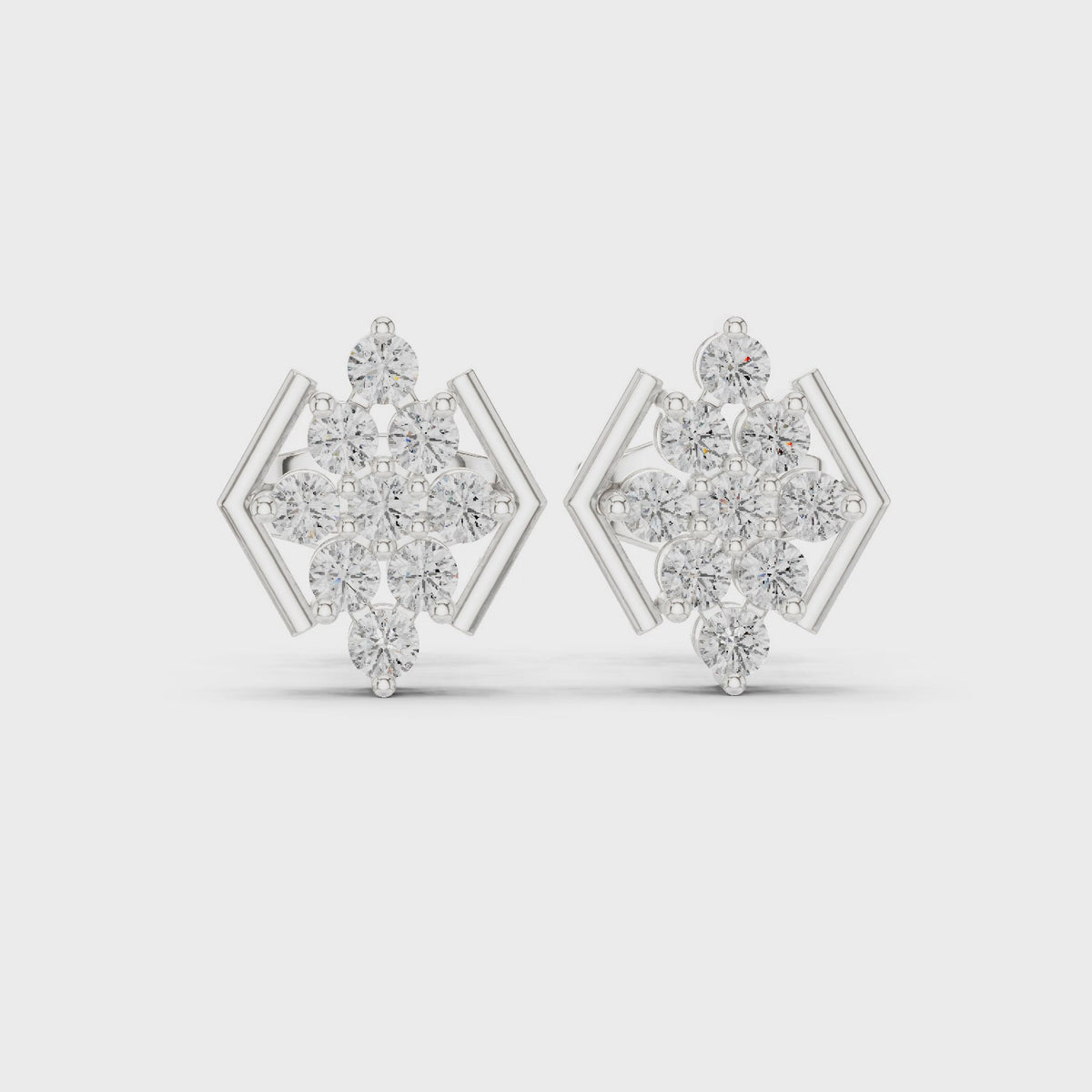 Round lab-grown diamond geometric cluster stud earrings in white gold, 360 degree video