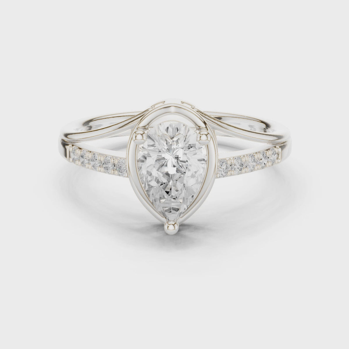 Pear lab-grown diamond bezel-set engagement ring with pavé band in white gold, 360 degree video