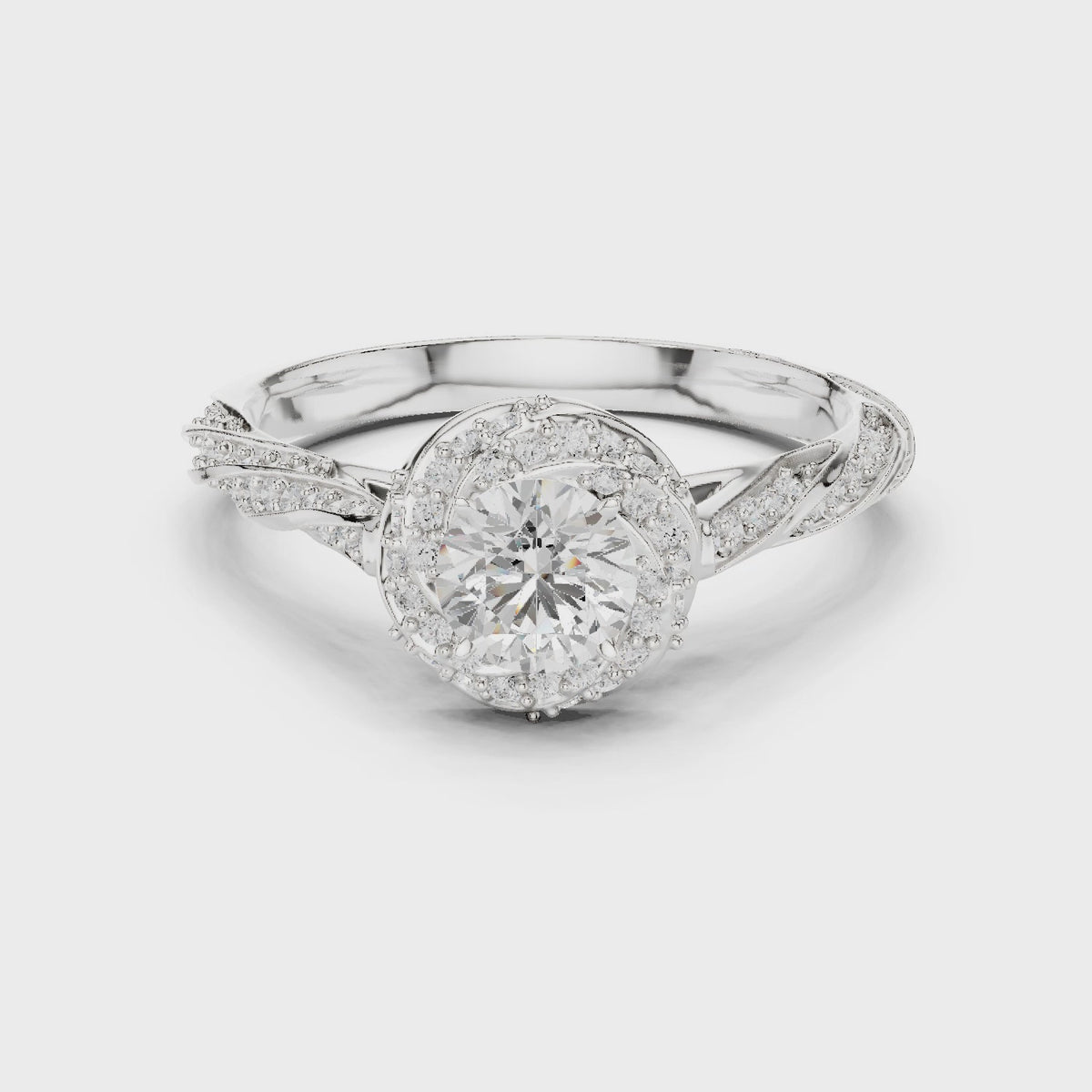 Round lab-grown diamond twisted halo engagement ring in white gold, 360 degree video