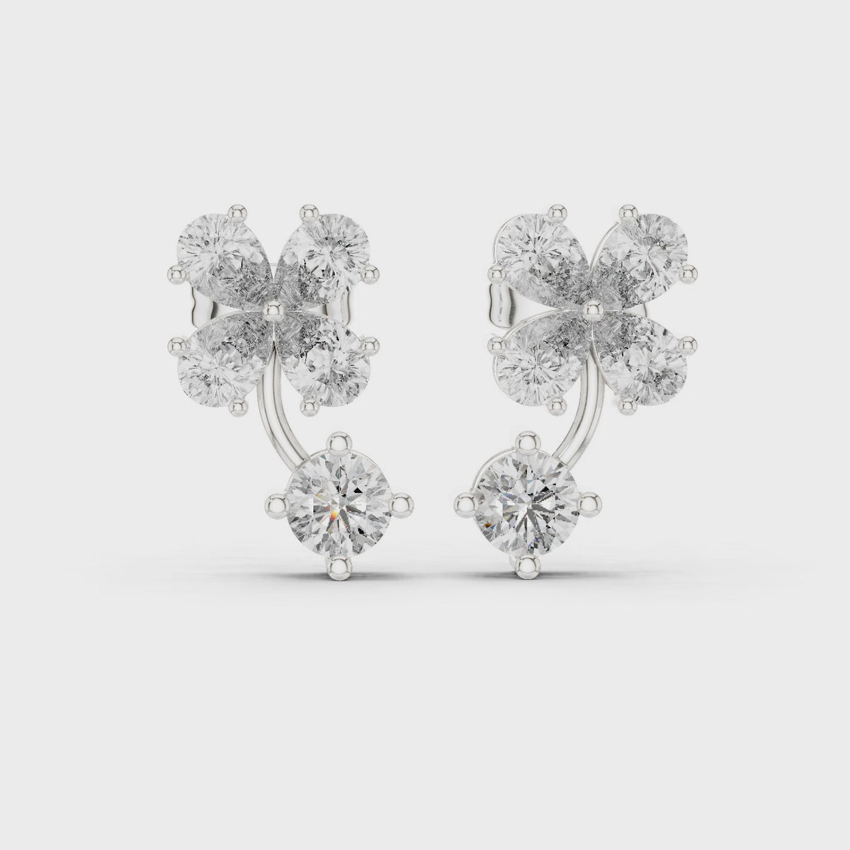 Pear and round lab-grown diamond butterfly cluster drop earrings in white gold, 360 degree video