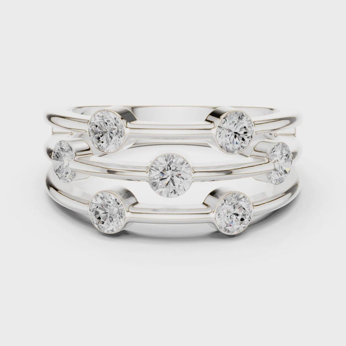 Round lab-grown diamond triple-row bezel station ring in white gold, 360 degree video