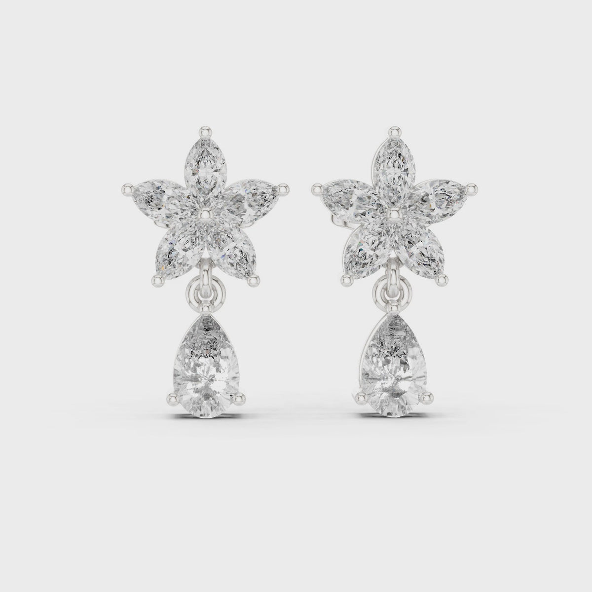Marquise and pear lab-grown diamond flower drop earrings in white gold, 360 degree video