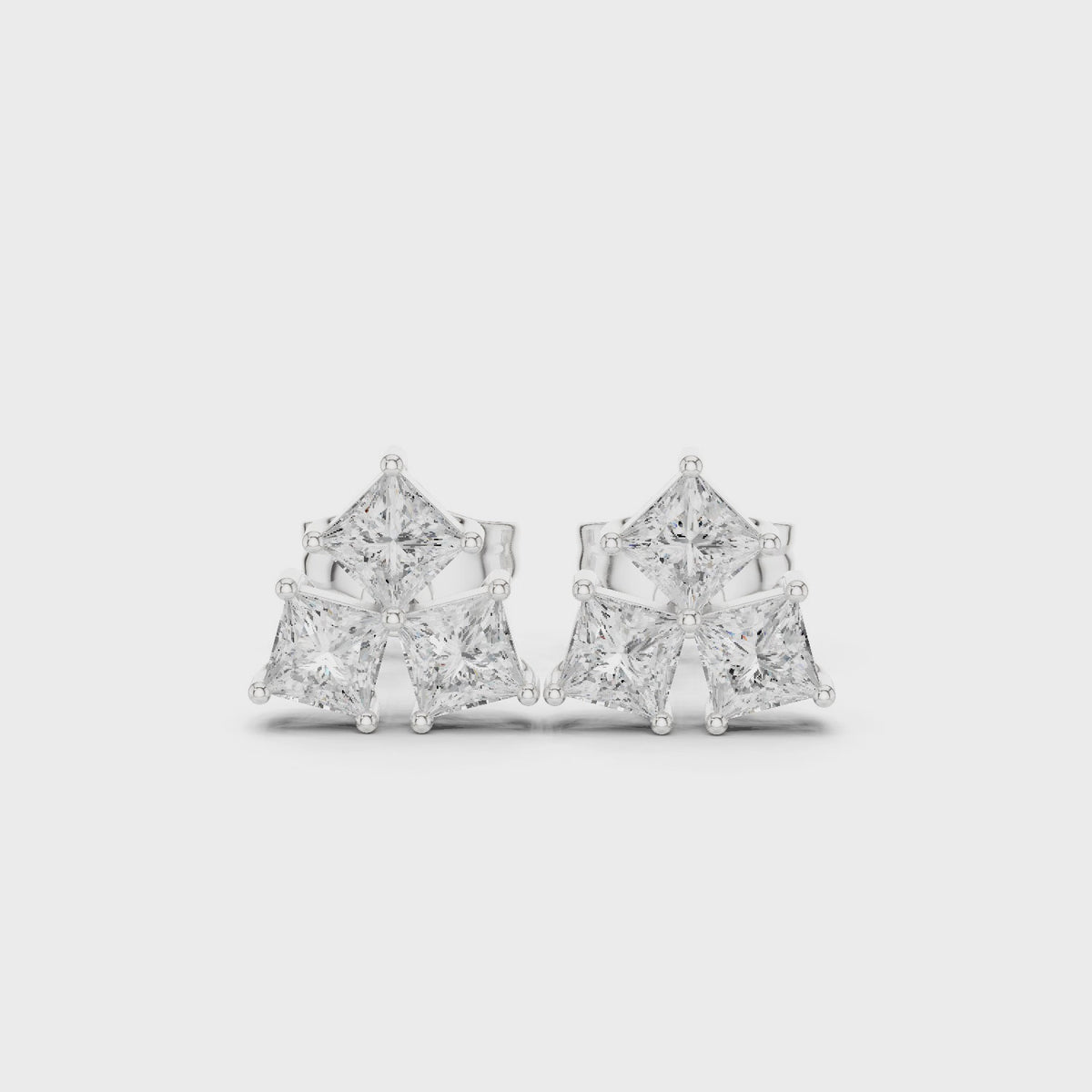 Princess-cut lab-grown diamond three-stone cluster stud earrings in white gold, 360 degree video