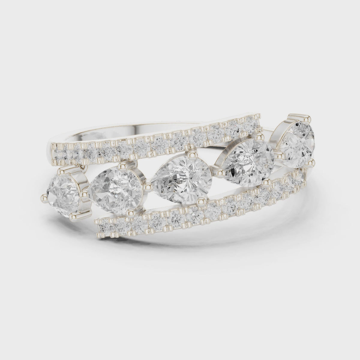 Pear and round lab-grown diamond statement ring in white gold, 360 degree video