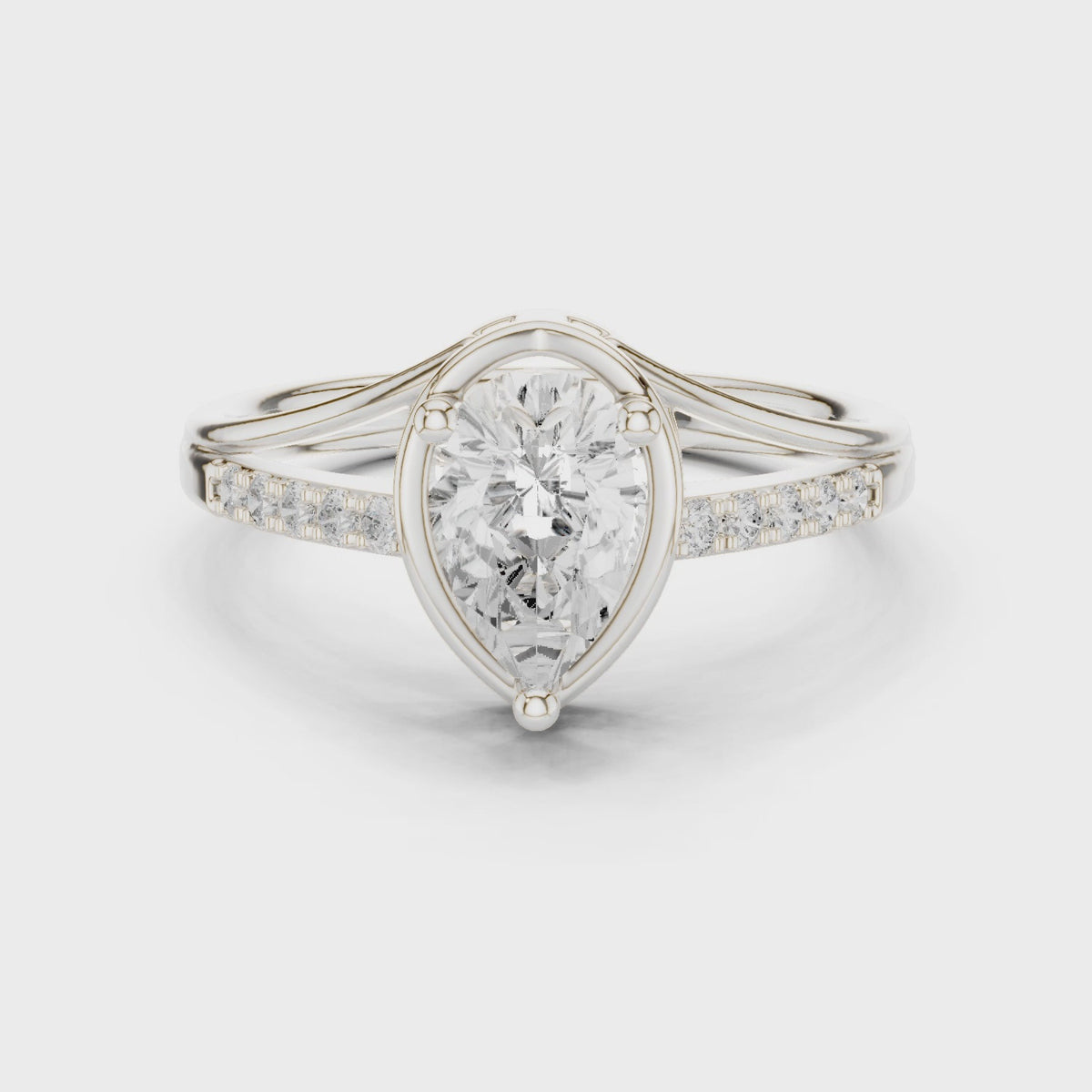 Pear lab-grown diamond bypass engagement ring in white gold, 360 degree video
