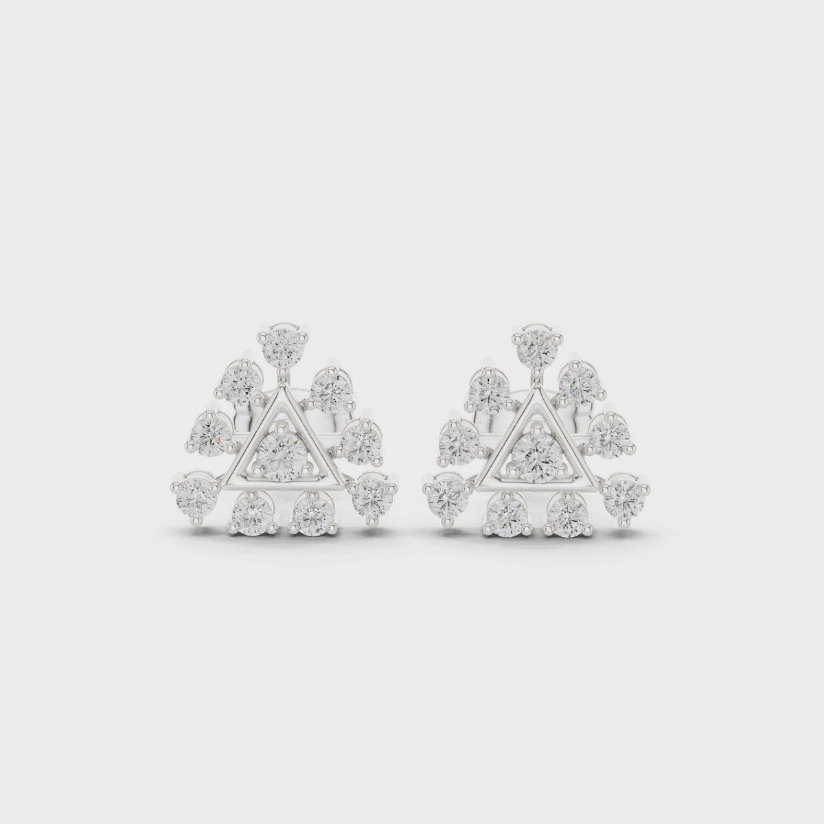 Round lab-grown diamond triangle cluster stud earrings in white gold, 360 degree video