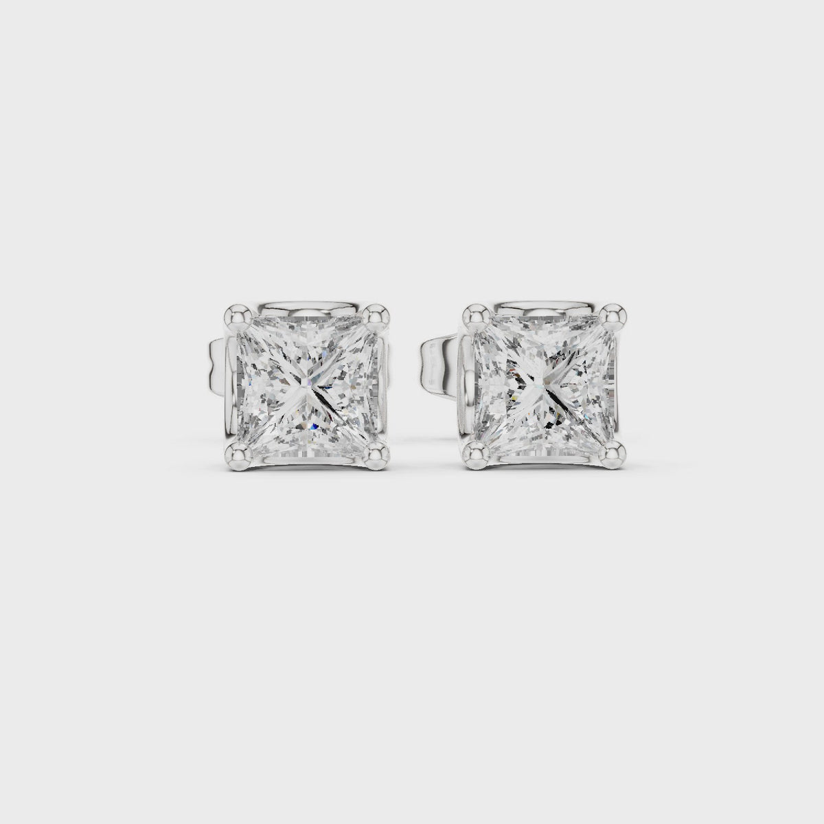Princess-cut lab-grown diamond solitaire stud earrings in white gold, 360 degree video