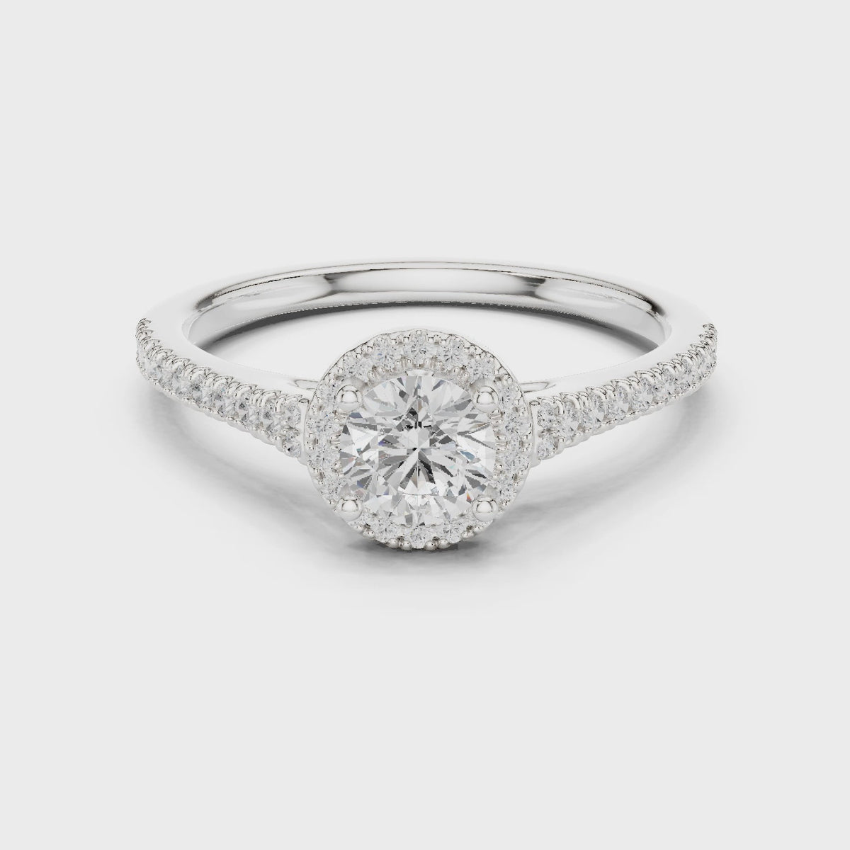 Round lab-grown diamond petite halo engagement ring in white gold, 360 degree video
