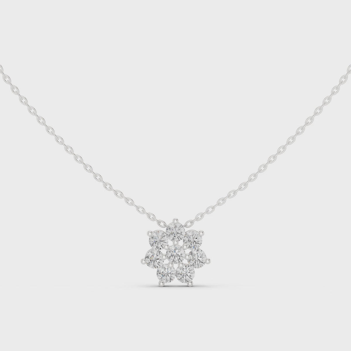 Round lab-grown diamond flower cluster pendant in white gold, 360 degree video
