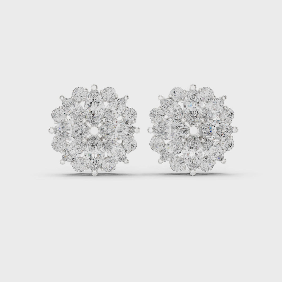 Marquise and round lab-grown diamond flower cluster stud earrings in white gold, 360 degree video