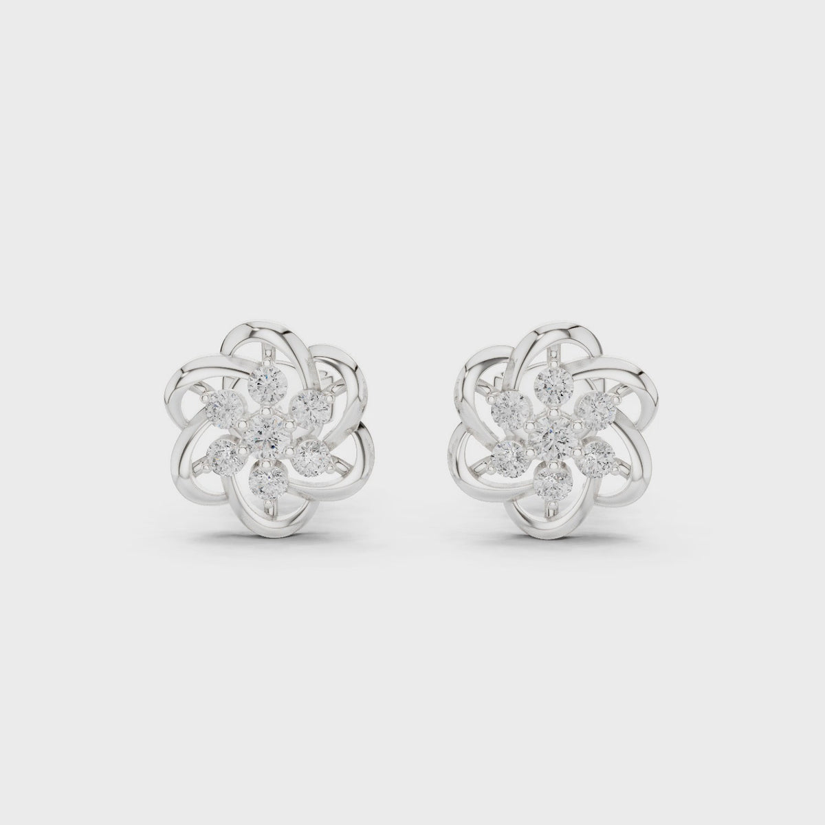 Round lab-grown diamond flower stud earrings in white gold, 360 degree video