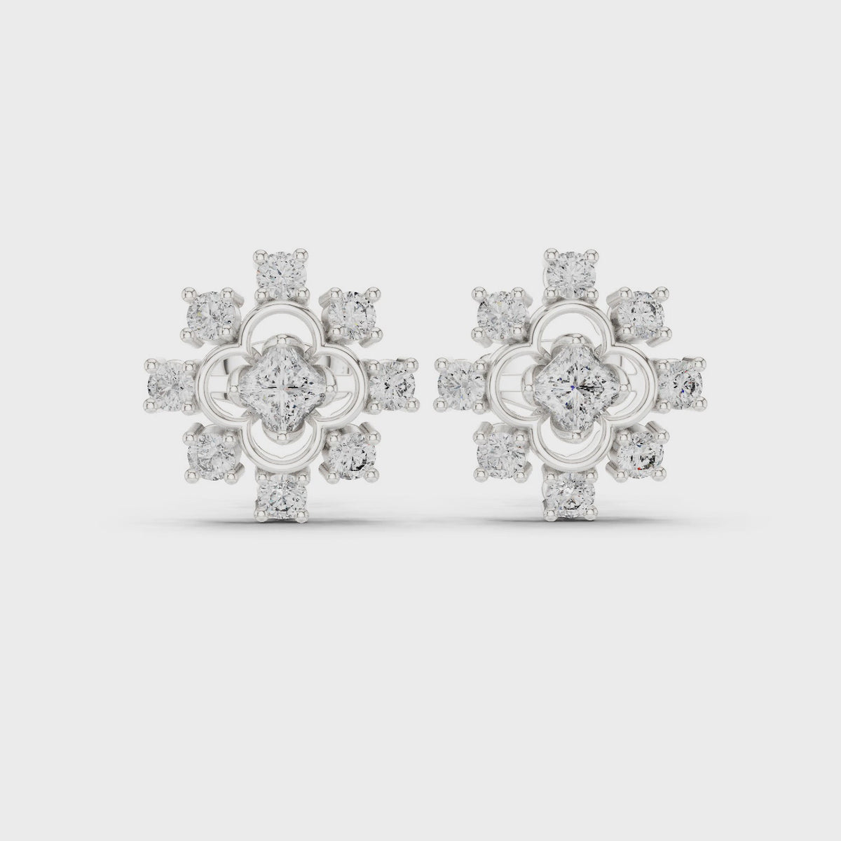 Round and princess-cut lab-grown diamond scalloped cluster stud earrings in white gold, 360 degree video