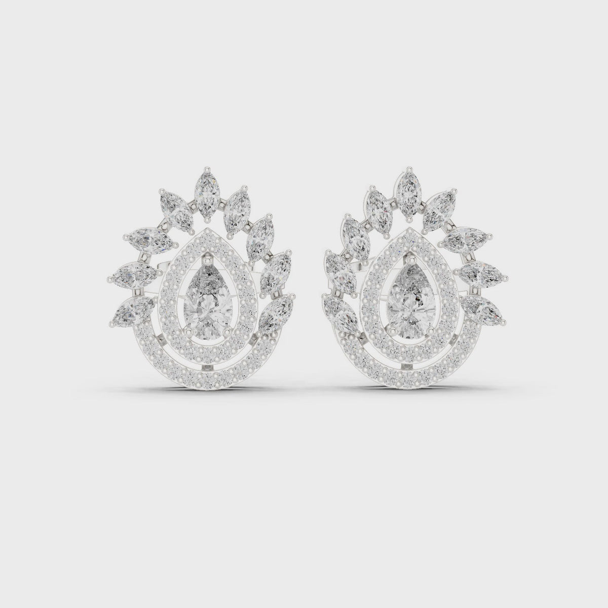 Marquise, pear and round lab-grown diamond double halo stud earrings in white gold, 360 degree video