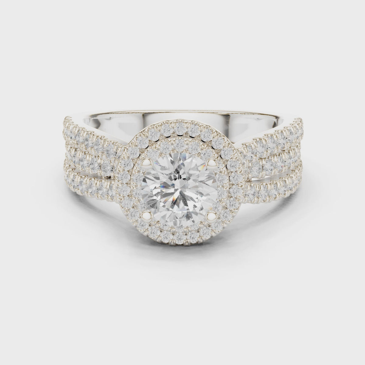 Round lab-grown diamond halo engagement ring in white gold, 360 degree video