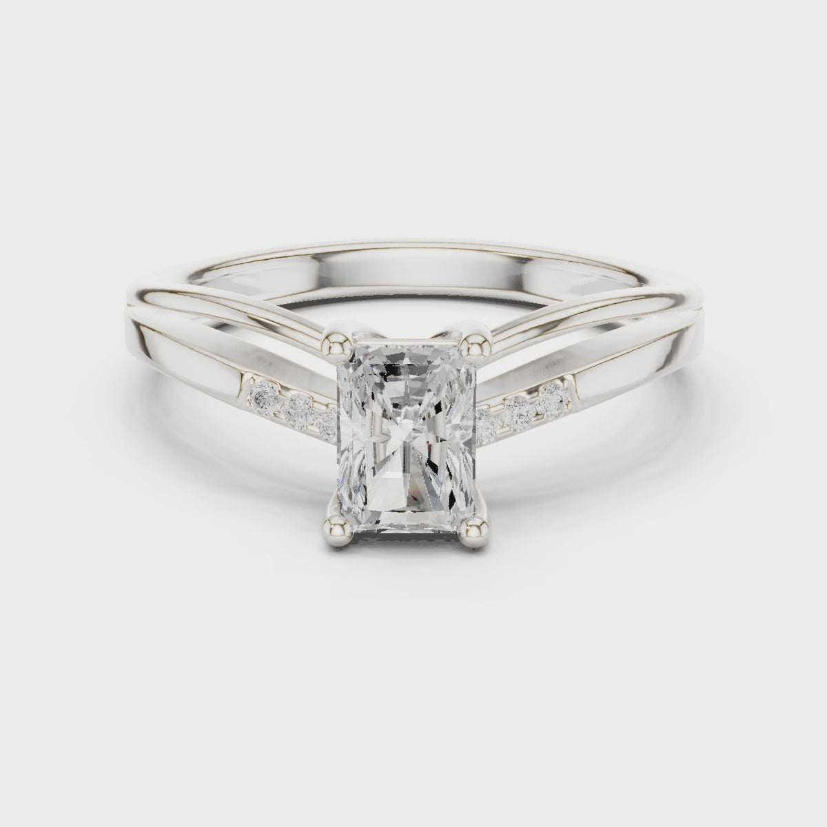 Radiant-cut lab-grown diamond cathedral engagement ring with accent diamonds in white gold, 360 degree video