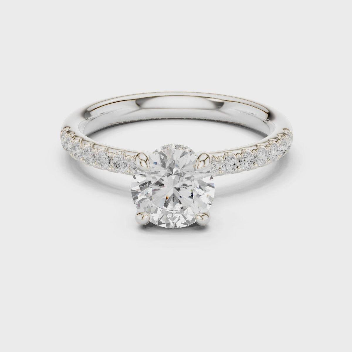 Round lab-grown diamond hidden halo engagement ring in white gold, 360 degree video