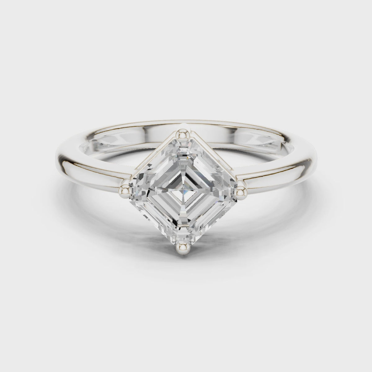 Square emerald-cut lab-grown diamond kite-set solitaire engagement ring in white gold, 360 degree video