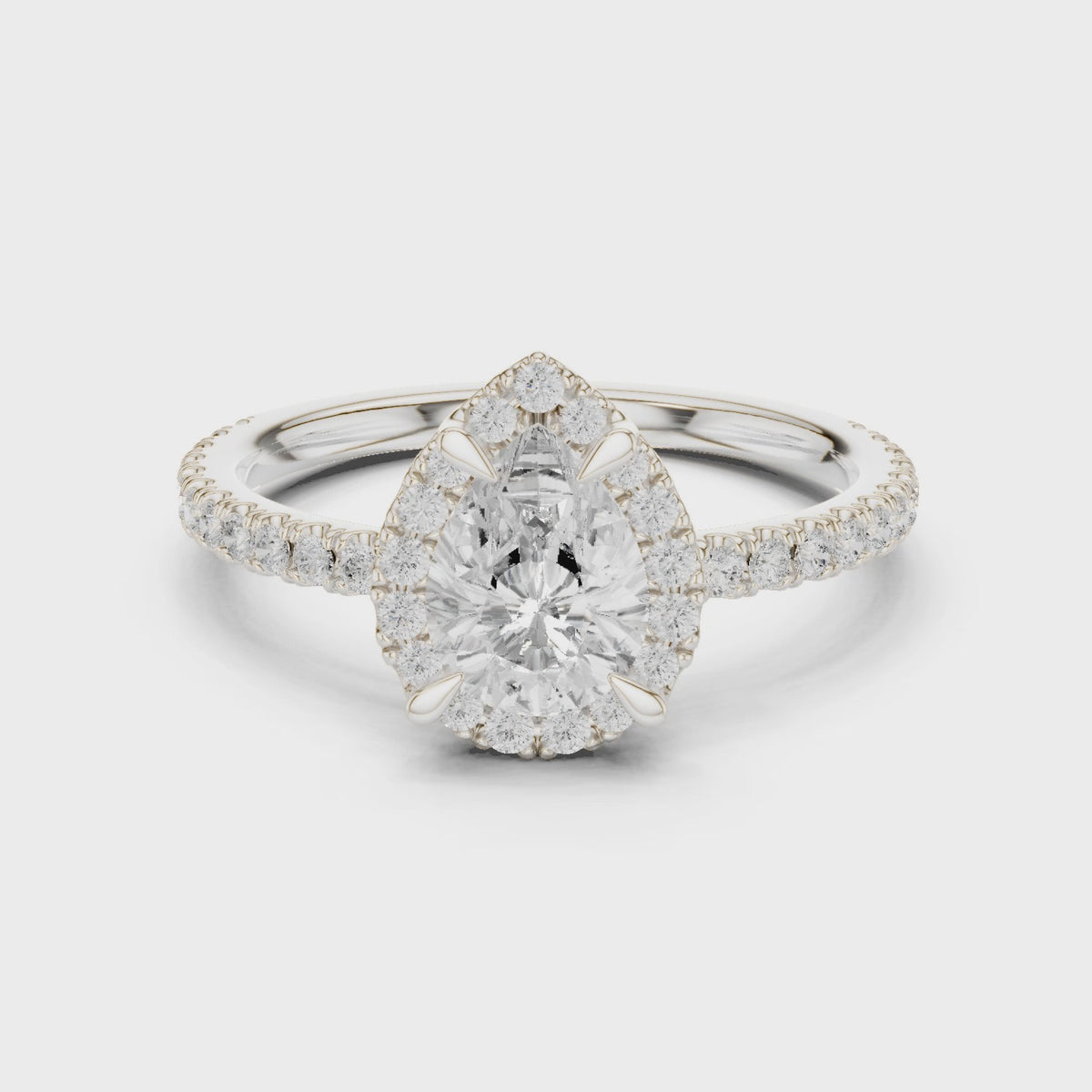 Pear lab-grown diamond halo engagement ring in white gold, 360 degree video