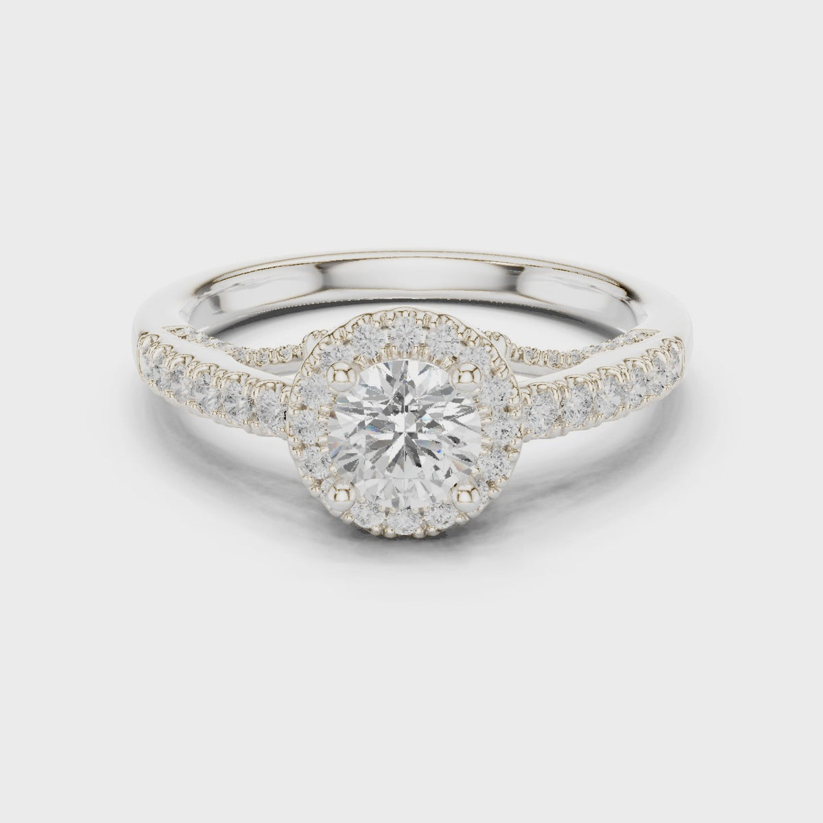 Round lab-grown diamond split shank halo engagement ring in white gold, 360 degree video