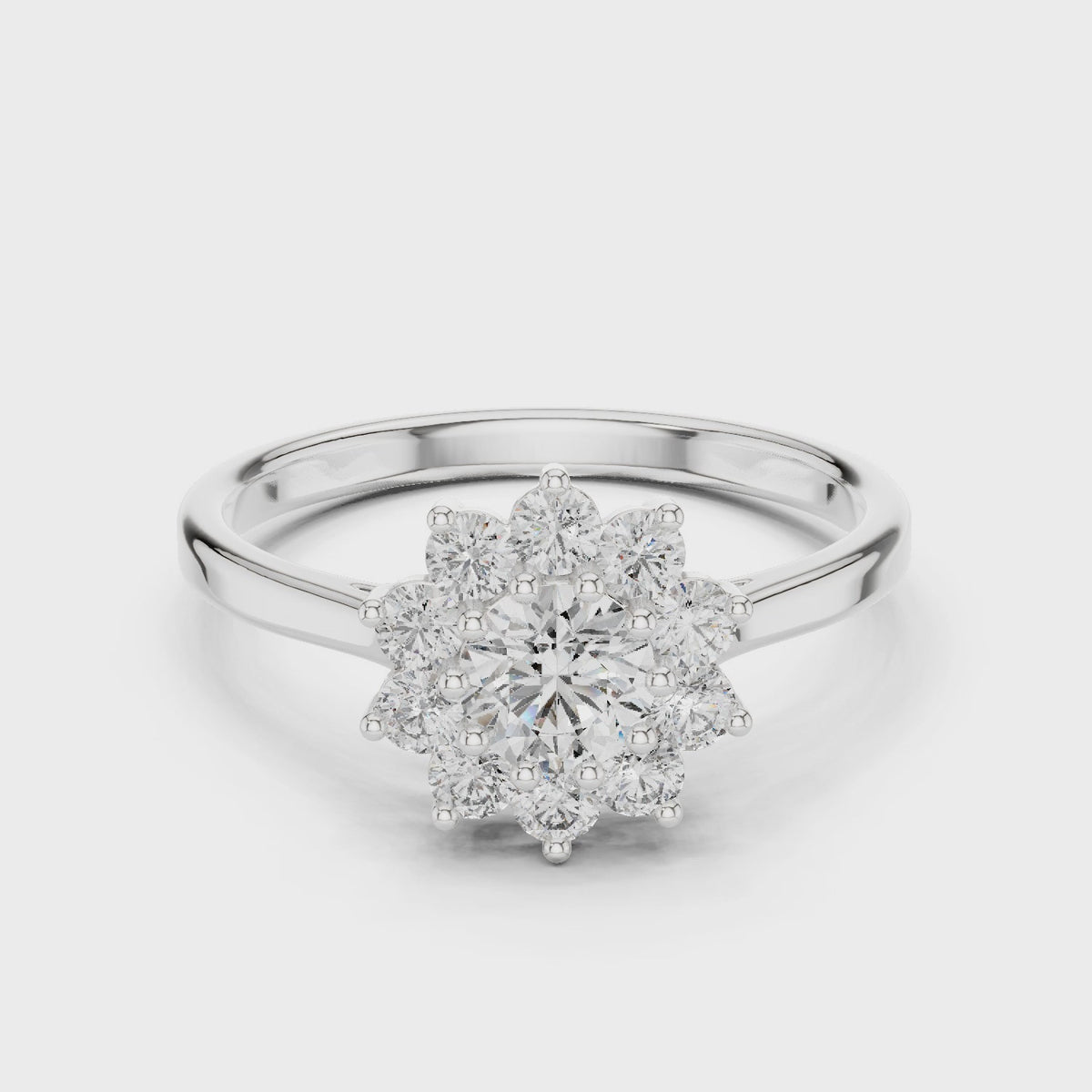 Round lab-grown diamond flower halo engagement ring in white gold, 360 degree video