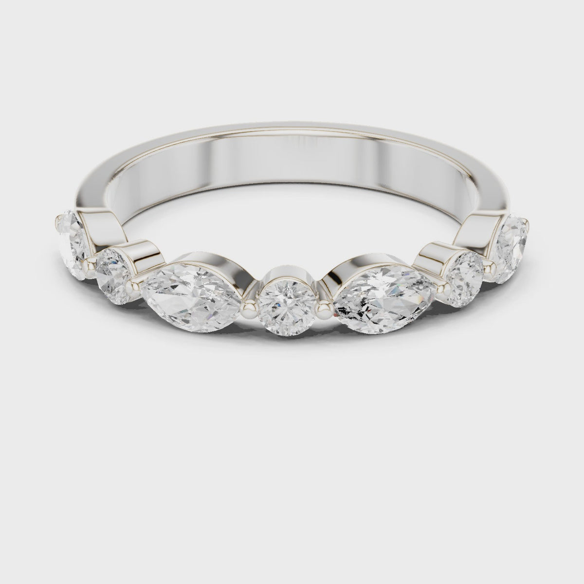 Marquise and round lab-grown diamond seven stone band in white gold, 360 degree video