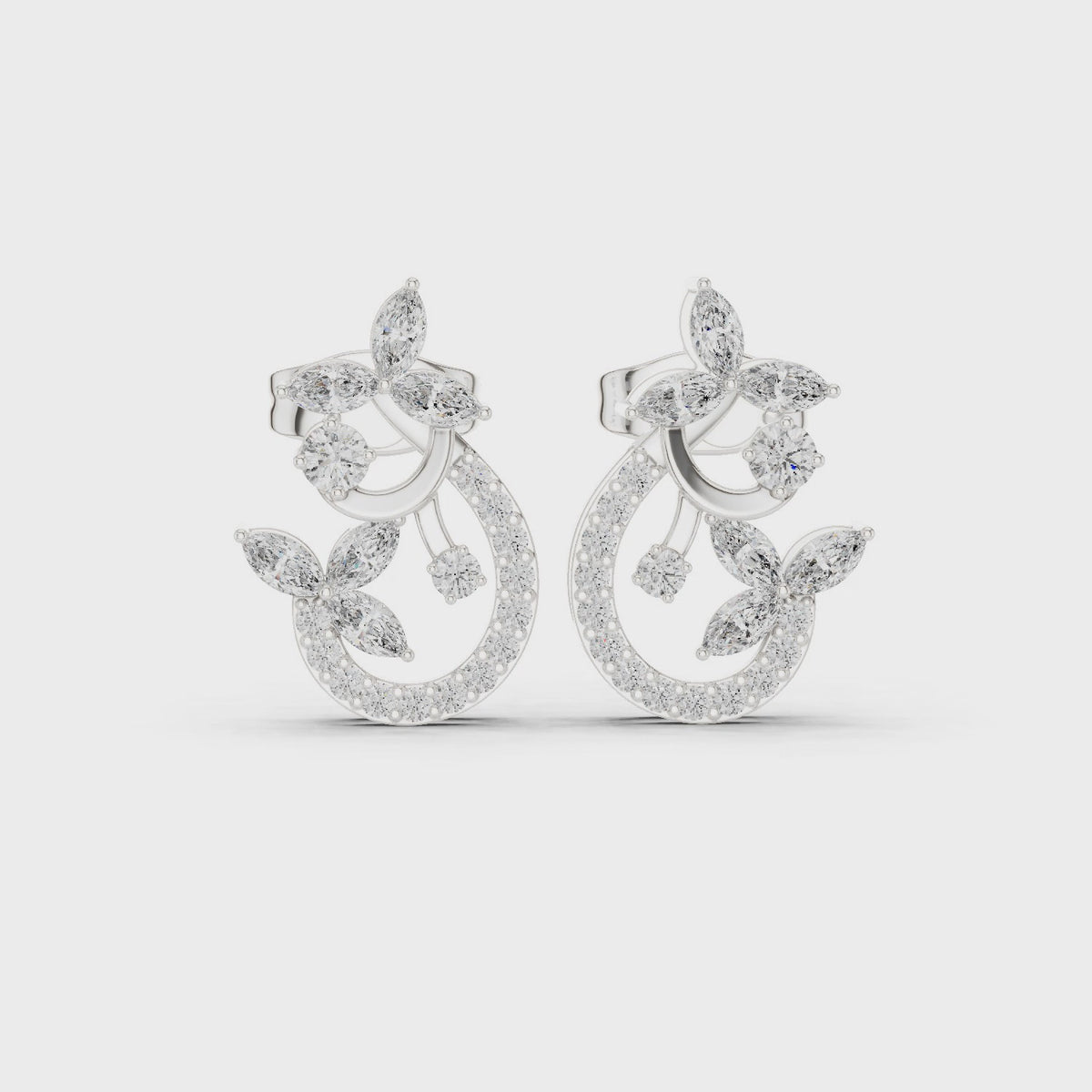 Marquise and round lab-grown diamond vine crescent stud earrings in white gold, 360 degree video