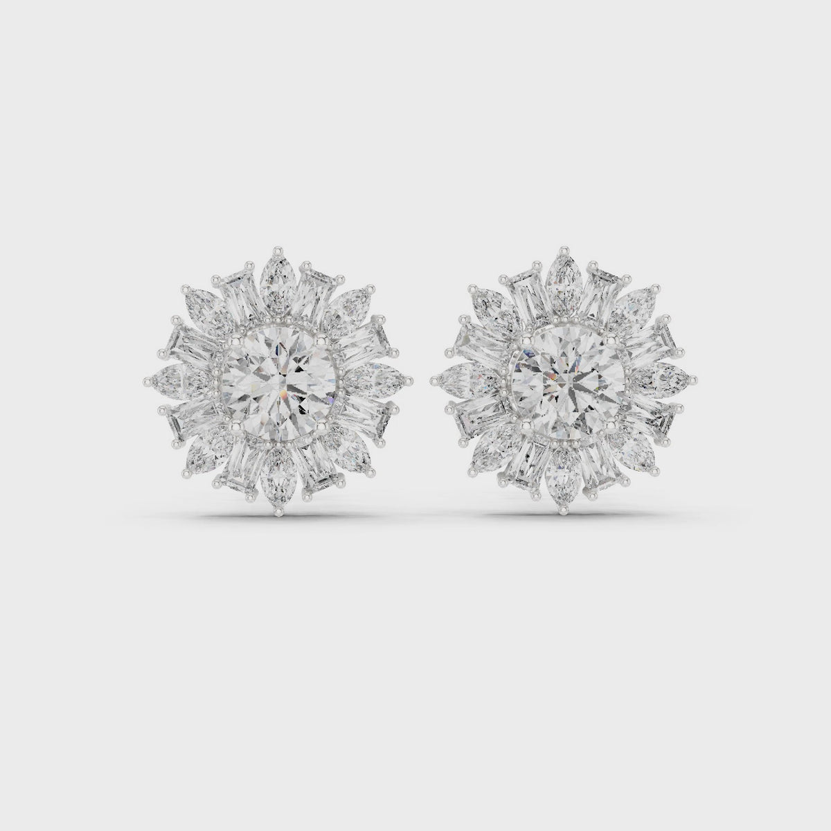 Round, baguette and marquise lab-grown diamond starburst cluster stud earrings in white gold, 360 degree video