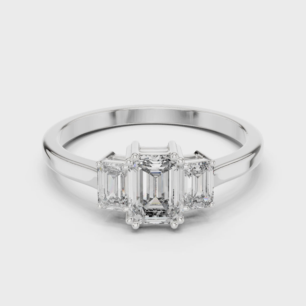 Emerald-cut lab-grown diamond three stone ring in white gold, 360 degree video