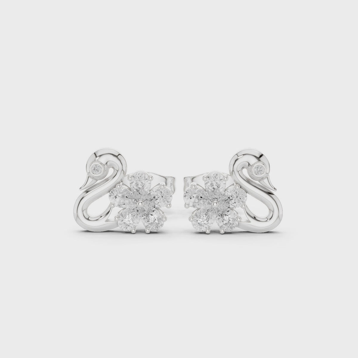 Pear and round lab-grown diamond swan stud earrings in white gold, 360 degree video