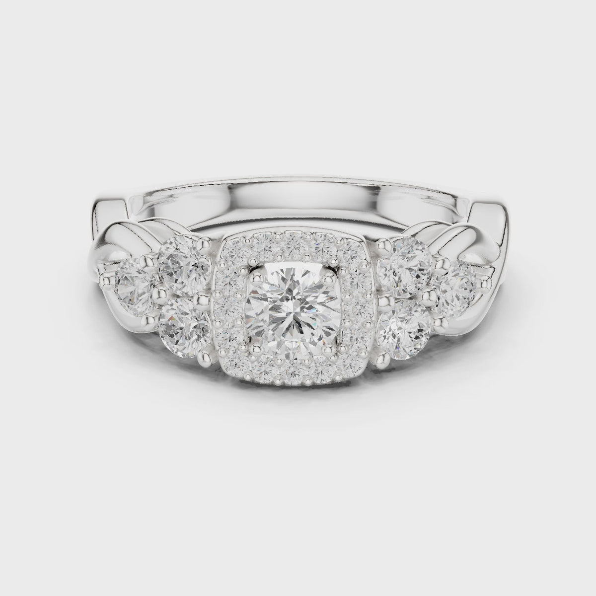 Round lab-grown diamond twisted halo engagement ring with side stones in white gold, 360 degree video