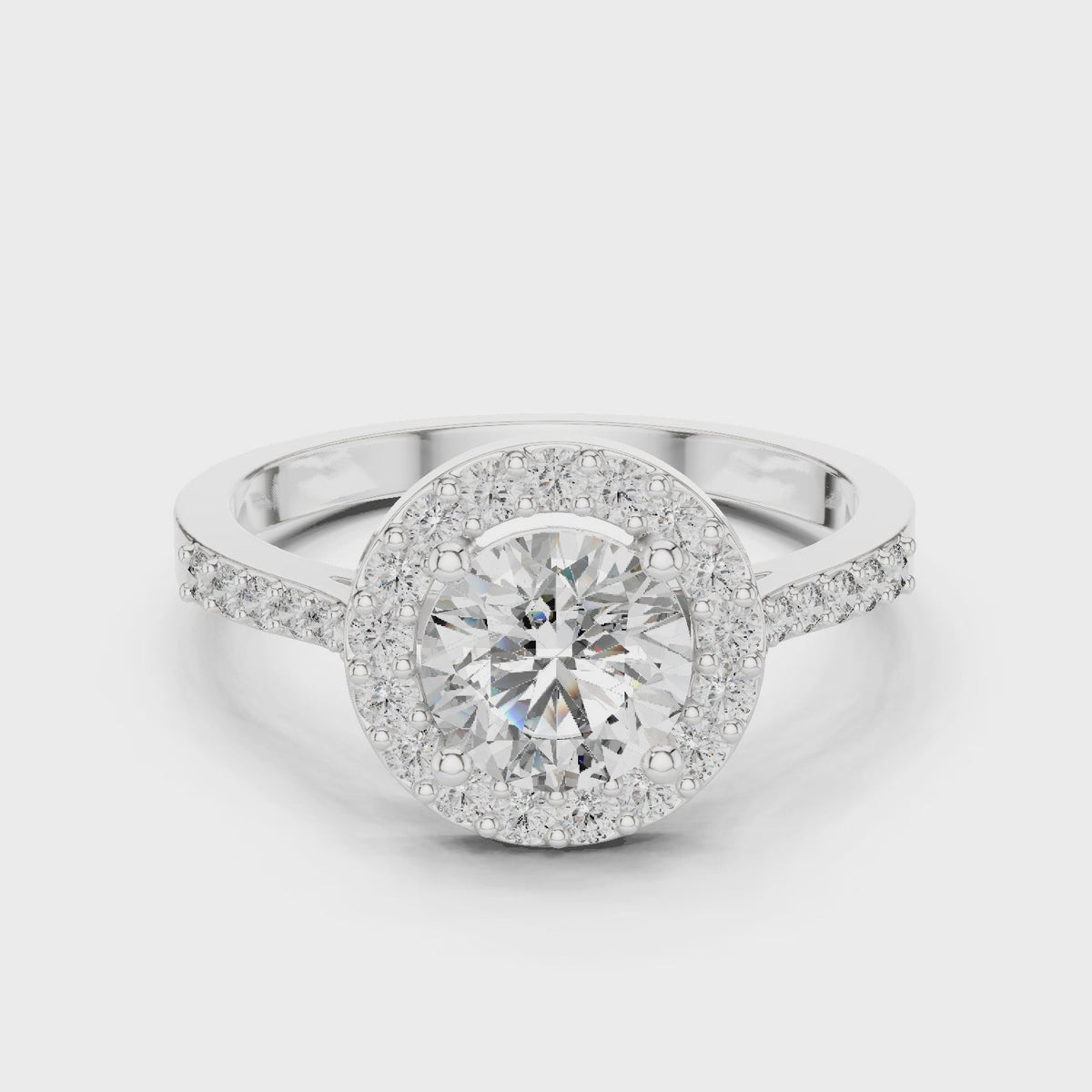 Round lab-grown diamond halo engagement ring in white gold, 360 degree video