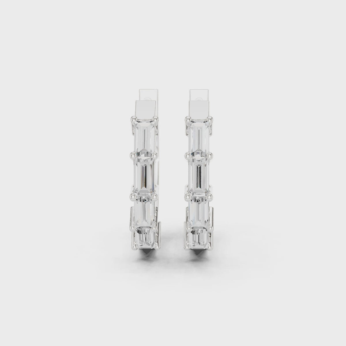 Baguette lab-grown diamond huggie hoop earrings in white gold, 360 degree video