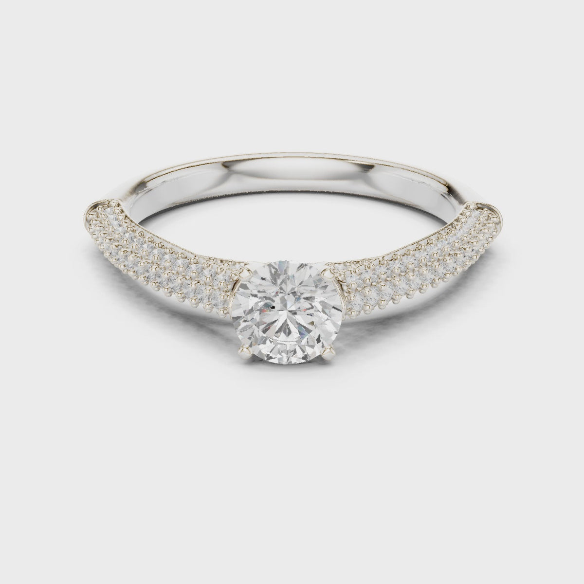 Round lab-grown diamond tapered pavé engagement ring in white gold, 360 degree video