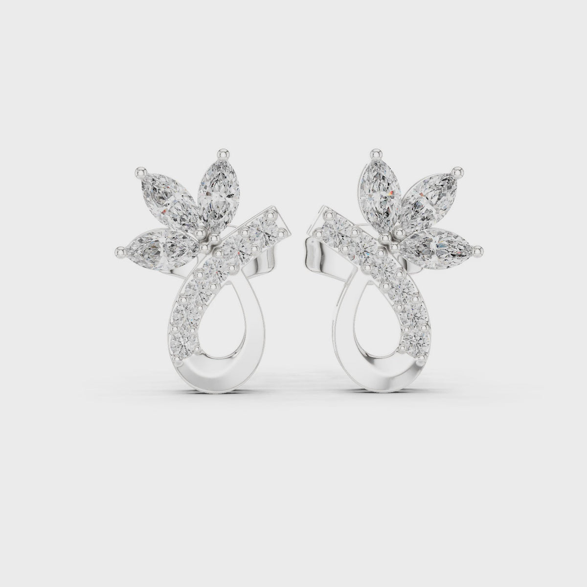 Marquise and round lab-grown diamond flower stud earrings in white gold, 360 degree video
