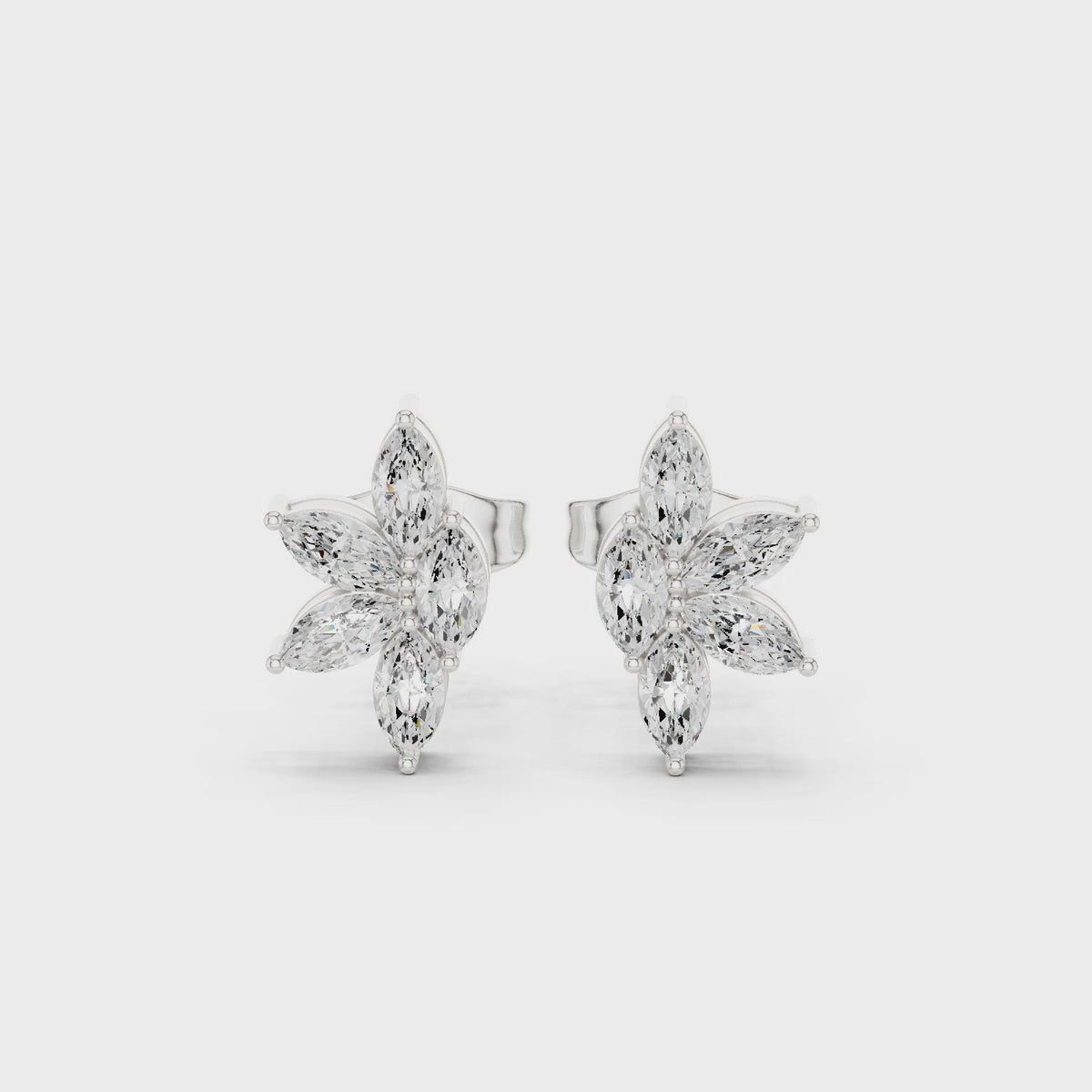 Marquise lab-grown diamond cluster stud earrings in white gold, 360 degree video