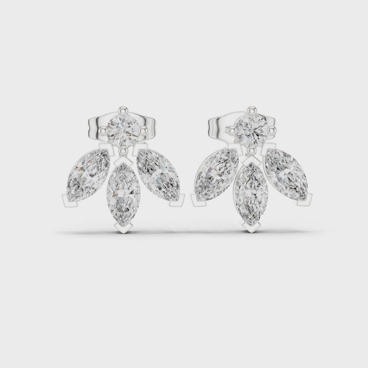 Marquise and round lab-grown diamond cluster stud earrings in white gold, 360 degree video